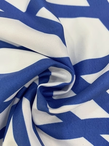 Macro detail of blue and white geometric stripe woven fabric texture and material