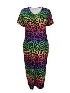 Detail view of V-neck and vibrant rainbow leopard print on a women long dress
