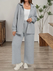 Women's two-piece waffle knit lounge set with button-down shirt and wide-leg trousers