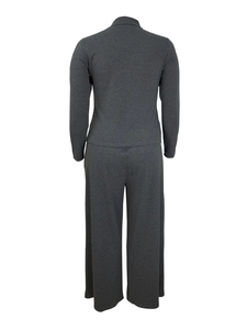 Detail of dark grey knit set back view with high collar top and wide leg pants