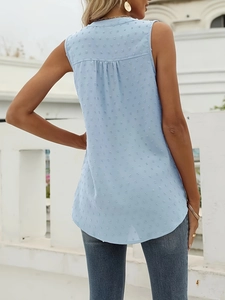 Elegant light blue Swiss dot sleeveless V-neck shirt with pleated back detail