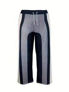 Women's plus size color-block joggers with elastic drawstring waist and straight leg design