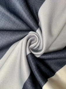 Macro texture of high-density knit mesh fabric in navy blue, grey and beige stripes