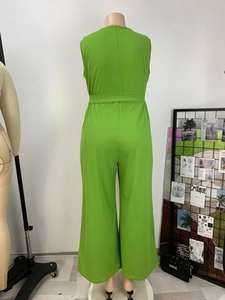 Back view of grass green sleeveless wide-leg jumpsuit with high waist belt and zipper