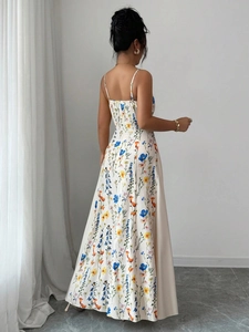 Elegant French-style slip dress with colorful floral print and slim fit back design
