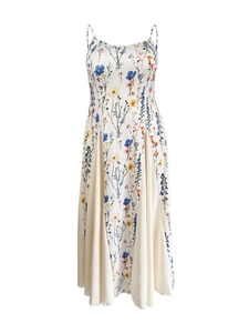 Detail of floral spaghetti strap dress showing lightweight fabric and pleated hem insert