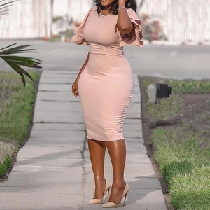 Detail of pink bodycon dress featuring double-layered ruffle sleeves and slim fit design