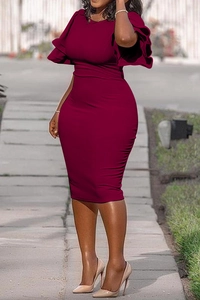 Detail of elegant wine red slim fit knee length dress with layered ruffle bell sleeves