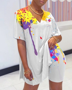 Detail of V-neck tunic and matching shorts with colorful ink-jet print pattern
