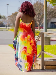 Detailed back view of a colorful tie-dye maxi dress with a loose silhouette and straps