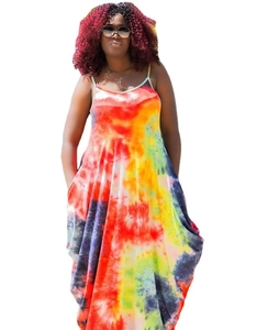 Detail of colorful tie-dye maxi dress featuring thin straps and a deep V-neckline