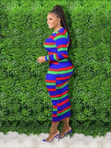Close-up of multicolored horizontal striped midi dress with long sleeves and slim fit