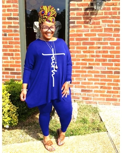 Detail of royal blue two-piece lounge set with Faith cross print on oversized top