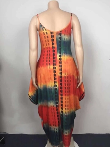 Detail view of colorful tie-dye sundress with irregular hem on a mannequin back