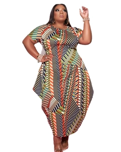 Detail of colorful geometric striped print and irregular hem on a boho maxi dress