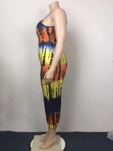 Detail of vibrant orange and blue tie-dye printed sleeveless loose summer jumpsuit