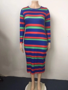 Detail of colorful striped long sleeve bodycon dress with vibrant pop art pattern