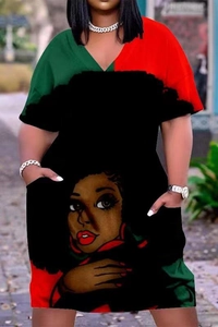Detail of V-neck summer dress with portrait print and colorful contrasting panels