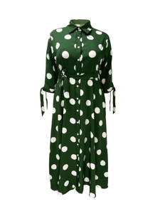 Close-up of green polka dot shirt dress featuring button-front and bow-tied cuffs