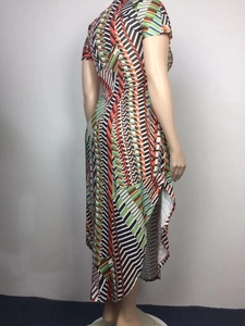 Detail of plus size short sleeve dress with asymmetric hem and colorful geometric pattern