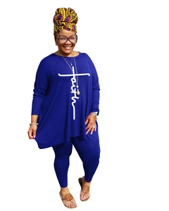 Detail of blue long sleeve top with white faith and cross print and matching leggings