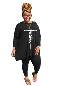 Detail of plus size loungewear set featuring white Faith cross print on black sweatshirt