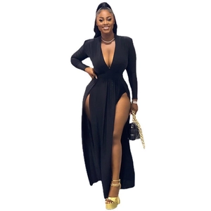 Detail of elegant black deep V-neck maxi dress with sexy double high side slits