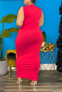 Close-up of red bodycon maxi dress featuring sleeveless design and stretchy fabric