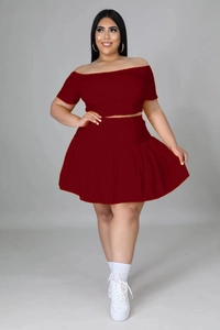 Detail of burgundy off-shoulder crop top and pleated mini skirt set for women