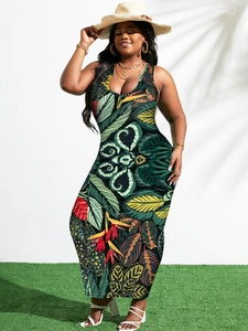 Detail of leaf print sleeveless maxi dress with deep U-neck in tropical floral pattern
