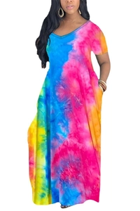 Detail showing vibrant multi-color tie-dye fabric with V-neckline and short sleeves