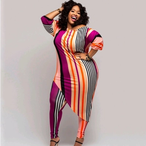 Plus size two-piece set with off-shoulder top and vibrant striped trousers for women