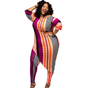 Detail of plus size two-piece set featuring asymmetrical hem and striped color-block print