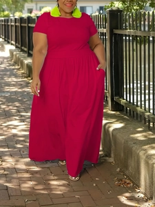 Detail of high-waist pleated hem on magenta plus size maxi dress with ankle length