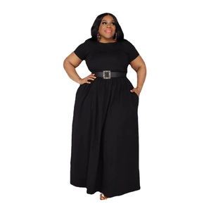 Detail of plus size black dress featuring a high waist belt with square rhinestone buckle