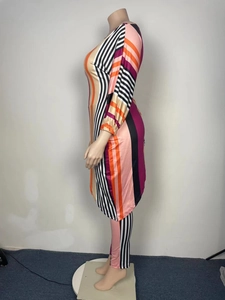 Detail of colorful vertical stripes and side slit design on casual longline two-piece set
