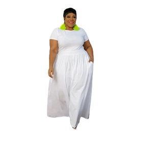 Detail of plus size white two-piece set featuring short sleeve T-shirt and pleated maxi skirt