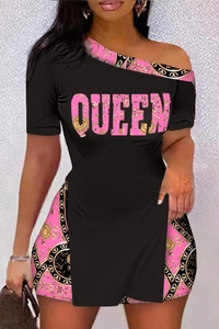Detail of baroque gold patterns and QUEEN text on a black off-shoulder mini dress
