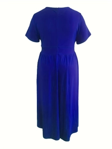 Back view of a dark blue short sleeve maxi dress with high waist seam and flowy skirt