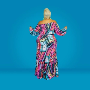 Close-up of vibrant multi-color geometric graffiti print on summer off-shoulder dress