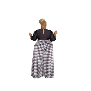 Women's plus size two-piece set featuring black cutout top and houndstooth wide leg pants