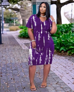 Detail of the V-neckline and purple tie-dye pattern on this casual plus size dress