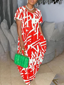 Close-up of red and white abstract graffiti print on a short-sleeved maxi dress
