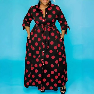 Elegant long sleeve black shirt dress with red polka dots and adjustable waist tie