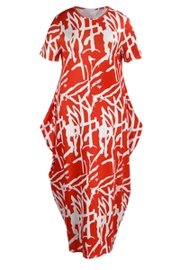 Detail of red and white abstract print on short sleeve midi dress with side pockets