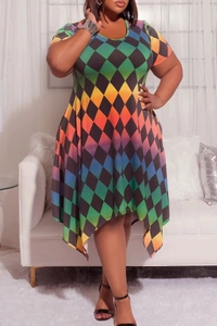 Detail of colorful rainbow diamond print fabric and irregular hem on a plus size dress