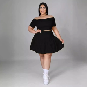 Women's sexy black two-piece set featuring off-shoulder short sleeve top and pleated skirt