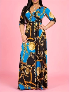 Detail of V-neck wrap dress with baroque gold chain print and elegant waist tailoring