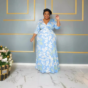 Elegant plus size light blue floral maxi dress with V-neck and three-quarter sleeves