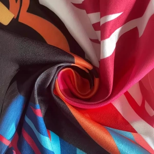 Fashionable V-neck dress featuring vibrant abstract digital prints on soft elastic fabric
